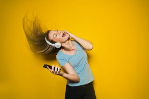 Girl Listening to Loud Music