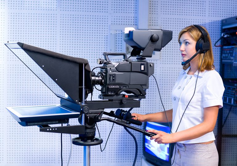 Female Camera Crew behind the camera