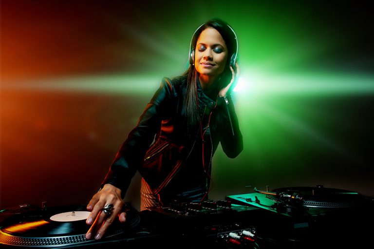 Woman DJ at the record decks